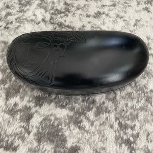 FREE with $20 + purchase. Versace glasses case.